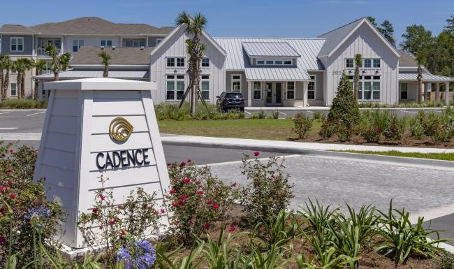 a sign in front of a building