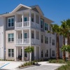 multi-level building with palm trees